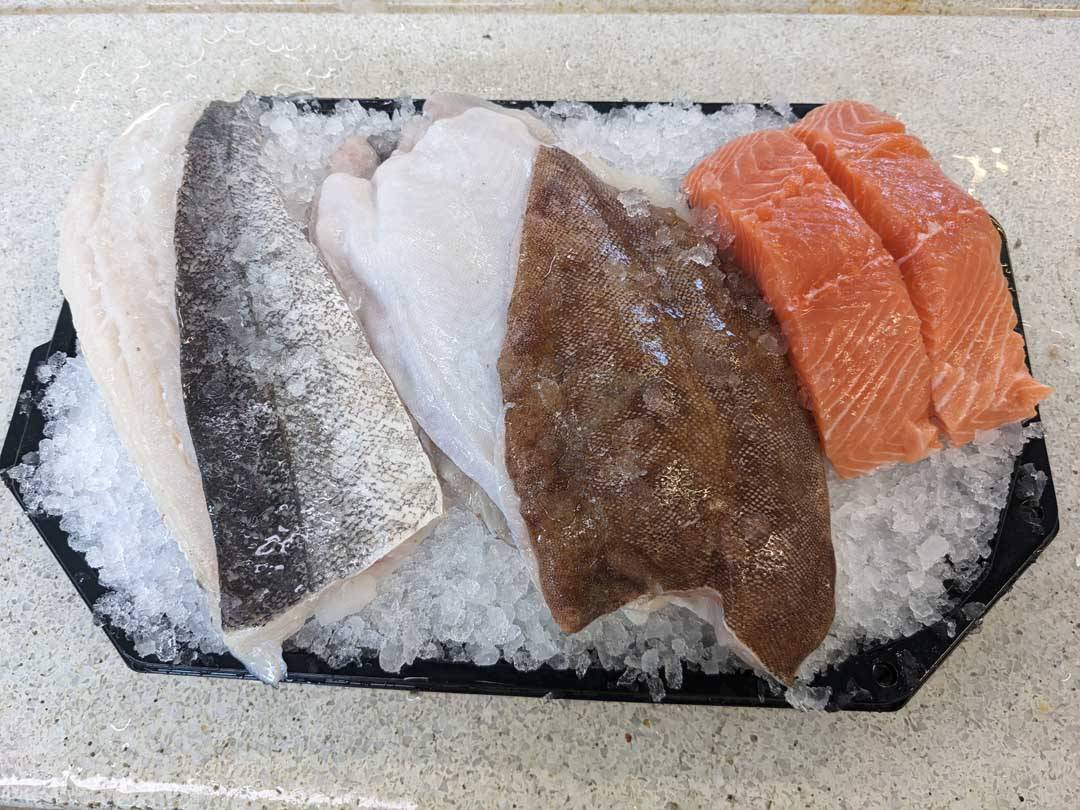 Lemon sole, hake and a side of salmon for the midweek dinner.