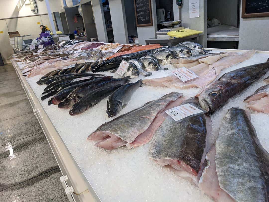 The Market Plaice counter inside Plymouth Market, stalls 9, 10 and 11